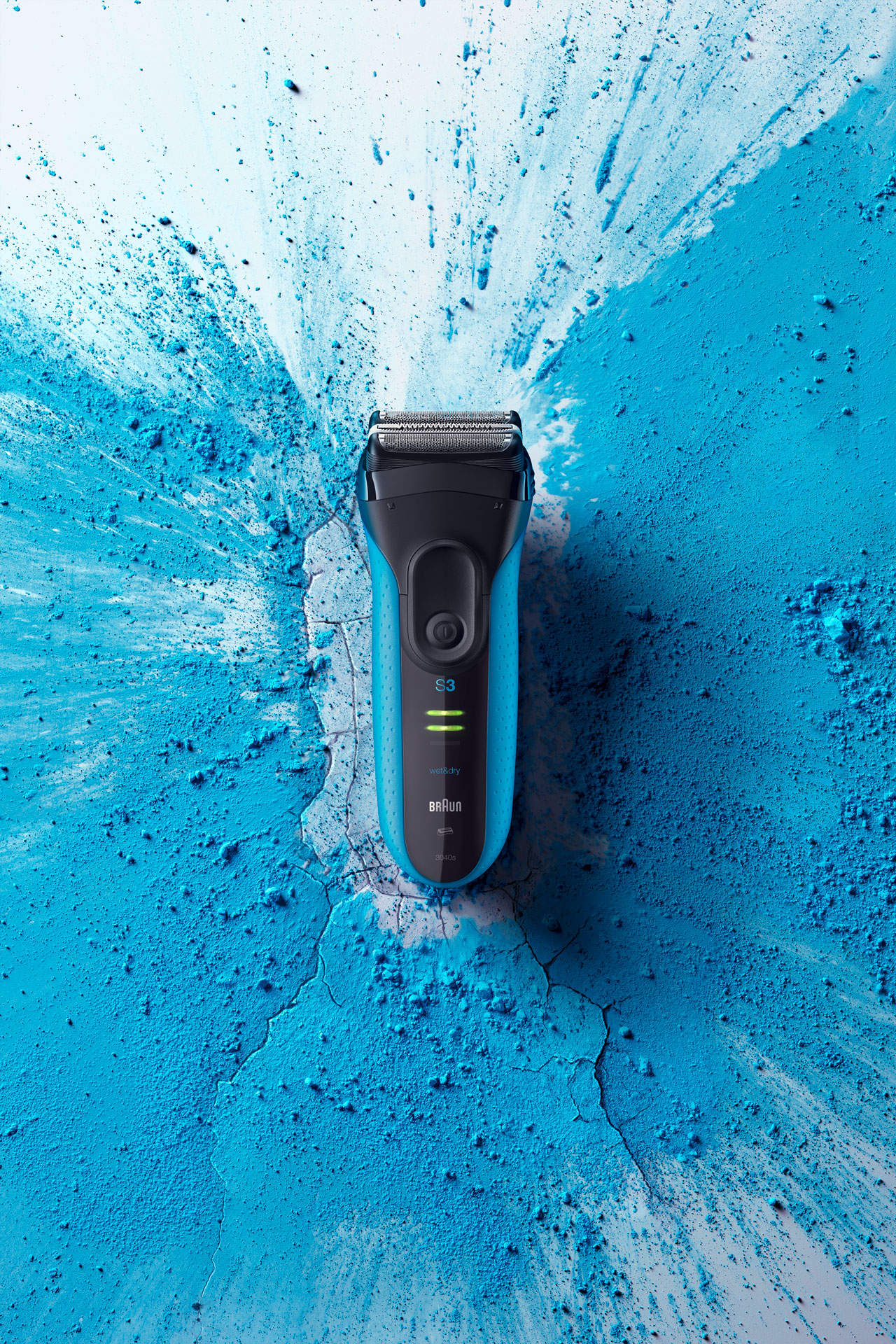 blue shaver with blue powder splash