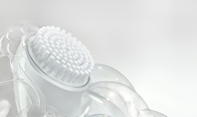 White background with bubbles surrounding white brush