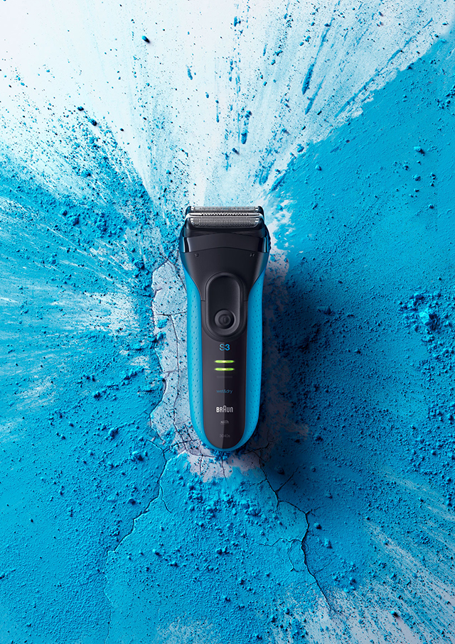 blue shaver with blue powder splash